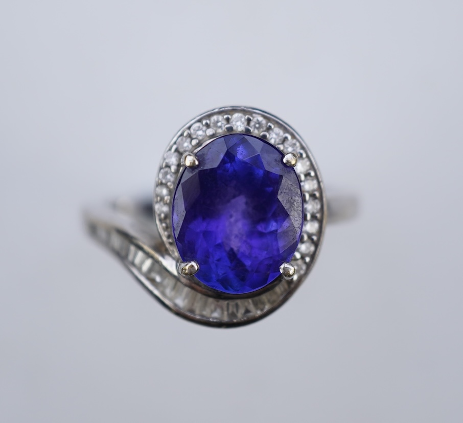 A tanzanite and diamond ring
